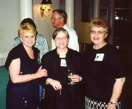 Laurie B., Sally S., Donna M. with Steve B. wandering by in the background.